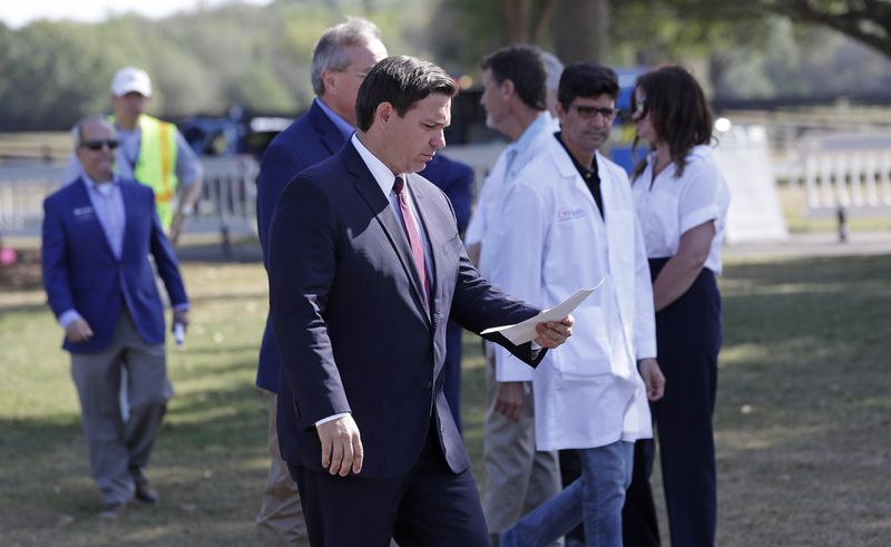 As Florida’s economy crashes, DeSantis says he’s going ahead with $543 million in tax refunds for corporations