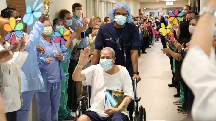 Central Florida hospital workers cheer as 63-year-old coronavirus patient is released