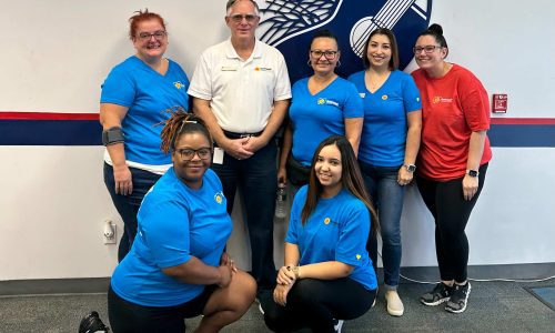 Suncoast Credit Union team members pose for a photo during a recent visit to Harry Chapin Food Bank. As part of Hunger Action Month, Suncoast Credit Union will match all donations to the food bank, up to $25,000, in September.