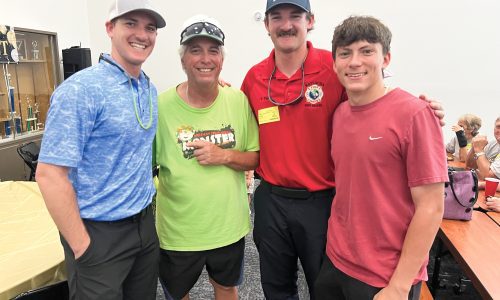 Coach Flaherty and his sons - Bailey, Tanner &
Will, celebrate Together!