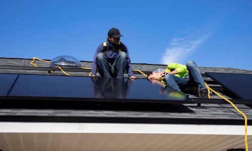 Solar Panel Installers on Roof2