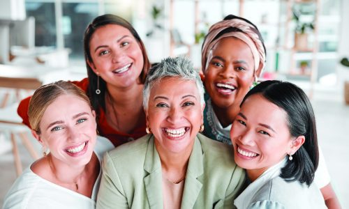 Teamwork, portrait or business women with smile, solidarity or goals together in a corporate modern office. Staff diversity, collaboration or happy people in a global advertising or marketing company.