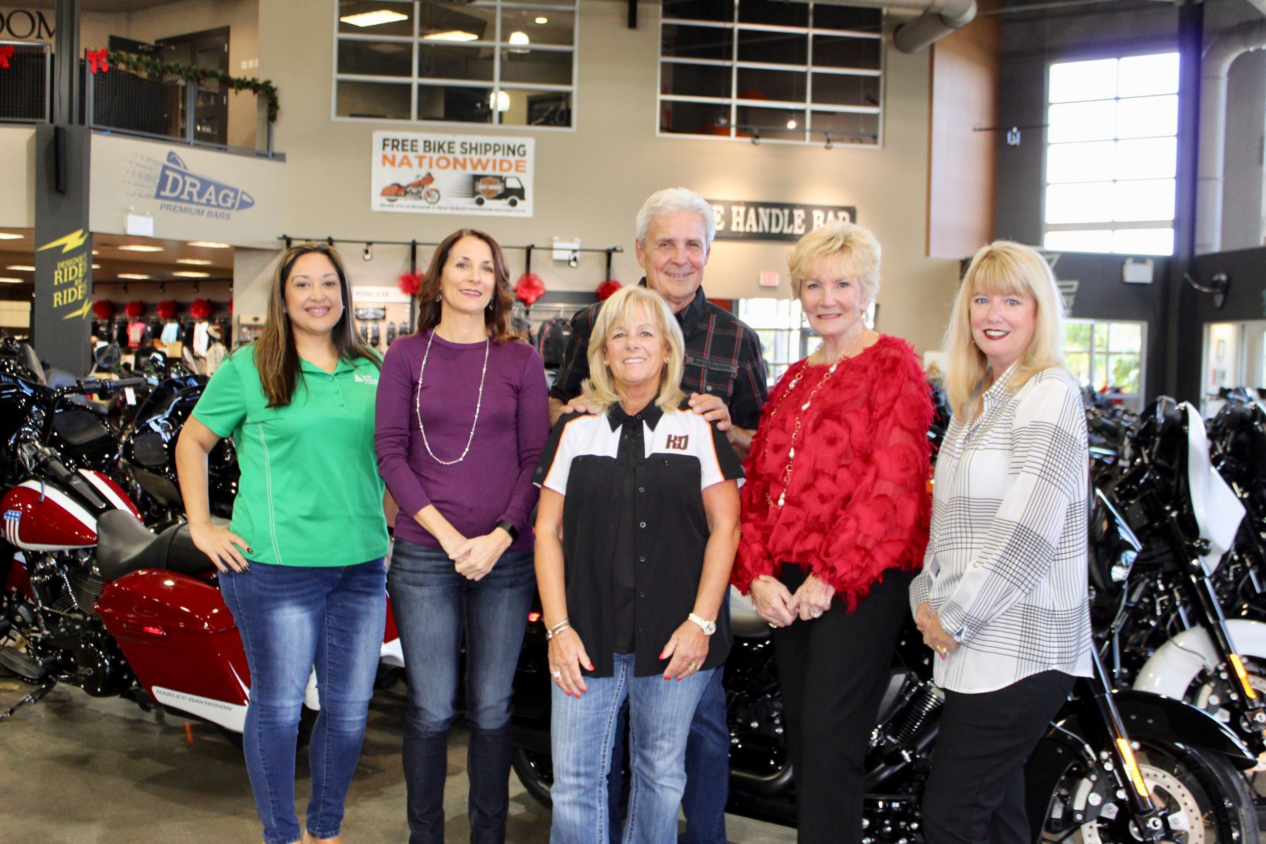 Rockstar Harley-Davidson donates $50K to support local children’s charities in SWFL that are the beneficiaries of the annual Slaw Dog golf tournament. (left to right: Stephanie Hoffman, Lisa Sands, Charlyn Veracka, David Veracka, Lee Knapp and Cecilia St. Arnold.)