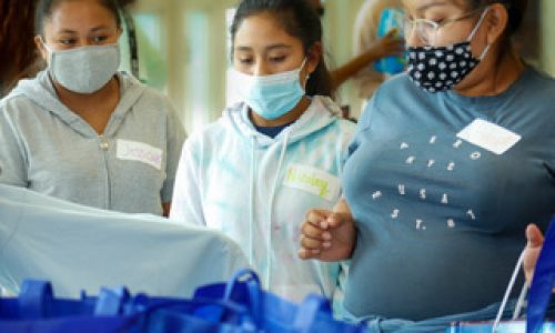 (1) Teen mothers receiving care packages at LAMP