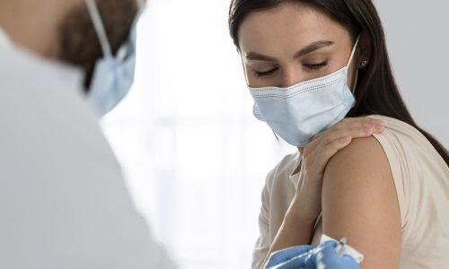 doctor-doing-vaccine-patient